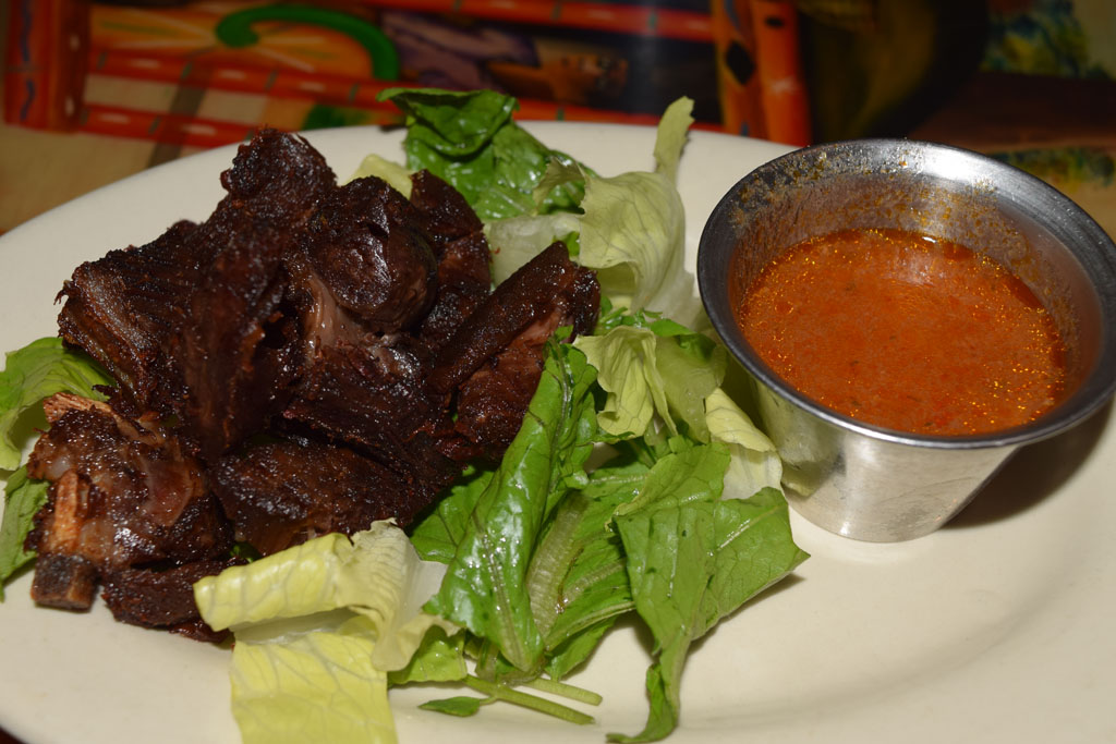 Tao kabrit (goat tidbits with creole dipping sauce)