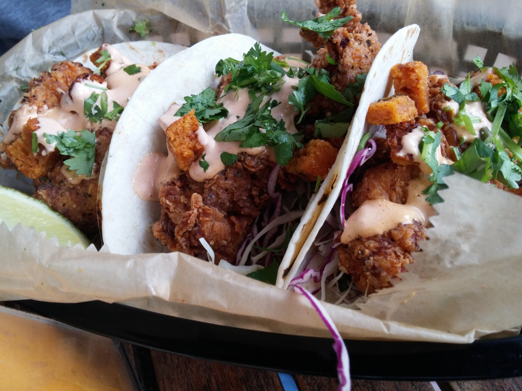 Fried Chicken Tacos with jalapeno cornbread, cabbage, anco ranch, and cilantro